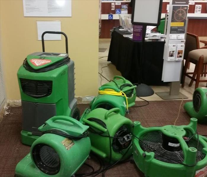SERVPRO water drying equipment in an office space.