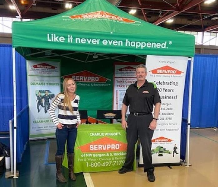 Pepy and Art and the SERVPRO booth at the Suburban Home Show
