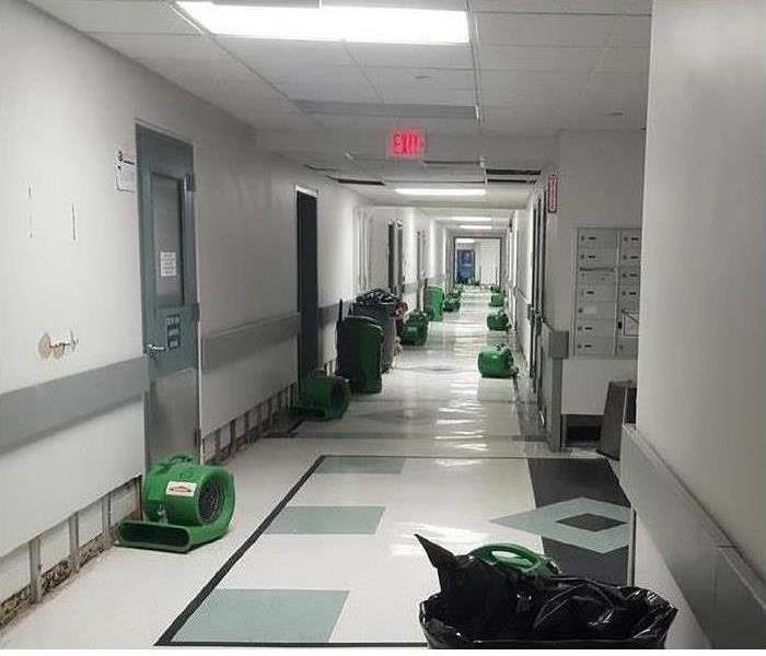 Office hallway with SERVPRO fans.