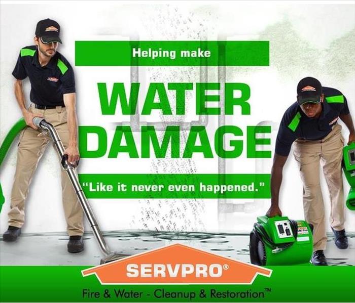 Two SERVPRO Technicians with equipment.