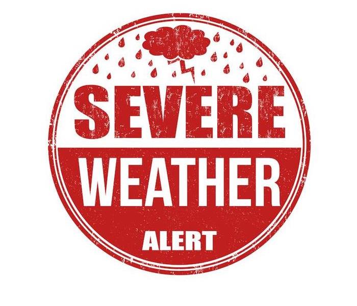 a red and white severe weather alert sign